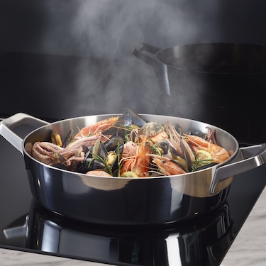 Steam from a seafood dish being extracted